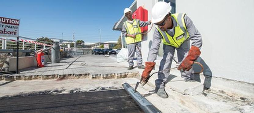 Building restoration work by Qabani National using advanced materials and skilled labour.